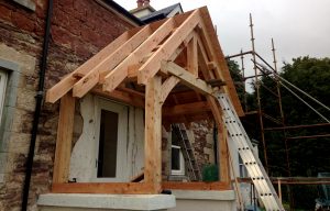 construction post and beam carpentry traditional joinery front porch extension